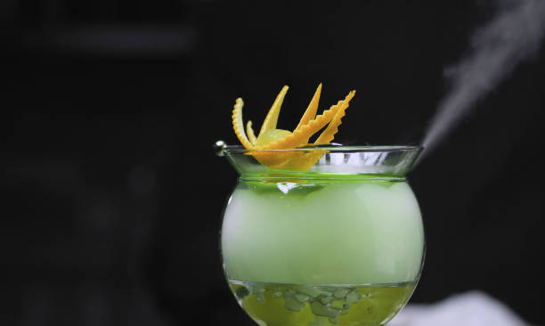 istock Grape Martini Cocktail cooling in a bowl with dry ice 1249962376