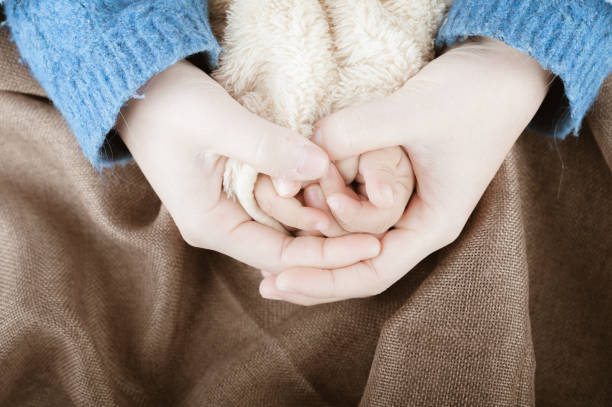 istock Baby girl holds  a pine cone 1249964865