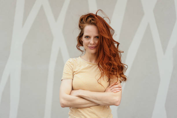istock Confident resolute young redhead woman 1249966734