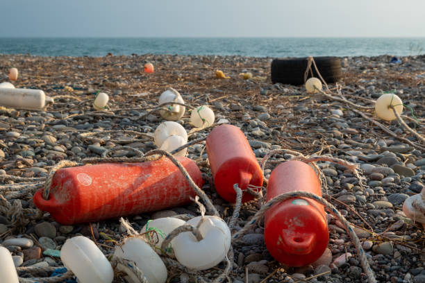 istock Cabled floats from fishing nets on the seashore. 1249969114