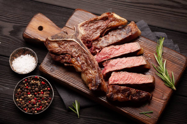 t-bone grilled beef steak - beef meat t bone steak steak imagens e fotografias de stock