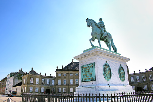Amalienborg Palace Square with a statue of Frederick V on a horse. It is at the centre of the  Amalienborg palace, which is the home of the Danish royal family, Copenhagen, Denmark.