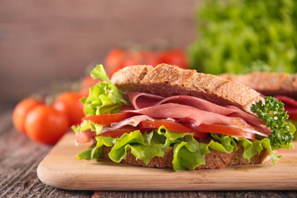istock sandwich with ham, tomato and lettuce 1249974288