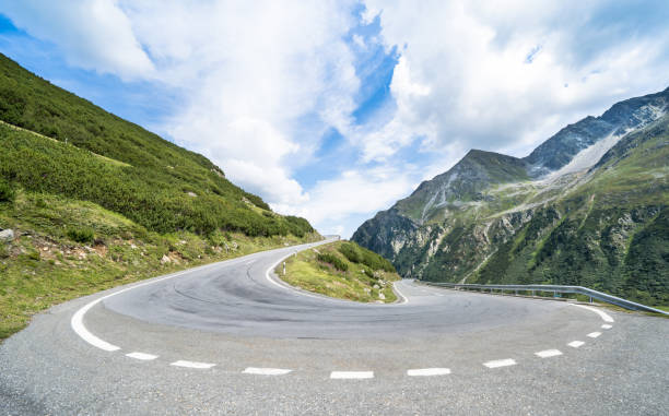 istock Mountain road with 180 degree turn 1249978030
