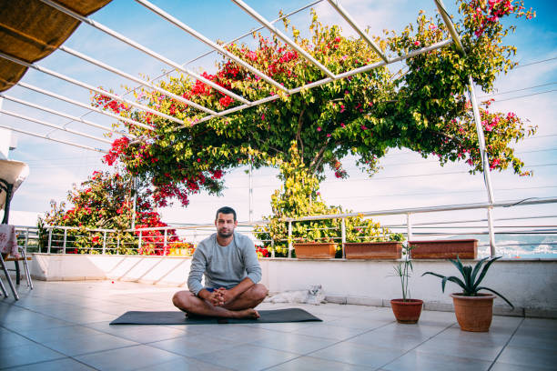 istock Man Waiting For Yoga Class 1249981254