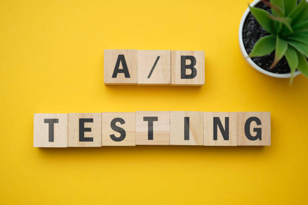 istock Modern marketing buzzword - A and B testing. Top view on wooden table with blocks. Top view. 1249985313