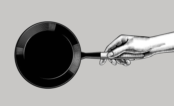 Female hand with a black frying pan Female hand with a black round frying pan. Vintage engraving stylized drawing. Vector illustration kitchen silhouettes stock illustrations