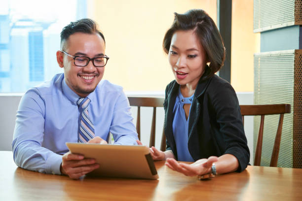 istock Two Business People Coworking 1249987093