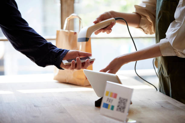 At the cash register where payment is made using a smartphone