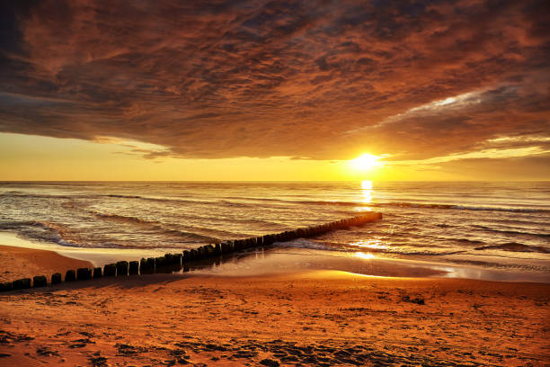 istock Golden sunset over Baltic Sea. 1249988480
