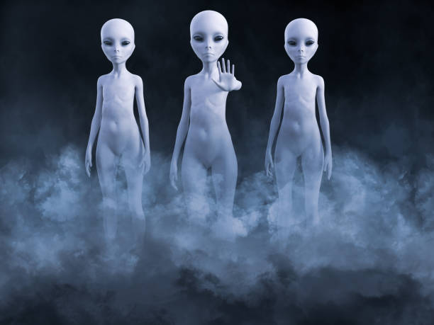 3D rendering of three aliens appearing in smoke. 3D rendering of an encounter with three aliens standing in smoke. One of them is holding up its hand like it's greeting you. grey alien stock pictures, royalty-free photos & images