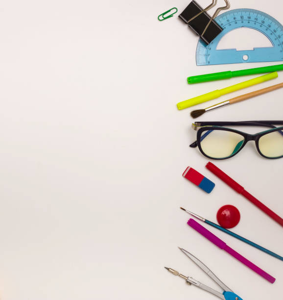 istock School mockup. Office supplies on a white background, free space for text. 1249992488