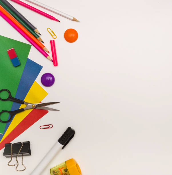 istock School mockup. Office supplies on a white background, free space for text. 1249992571