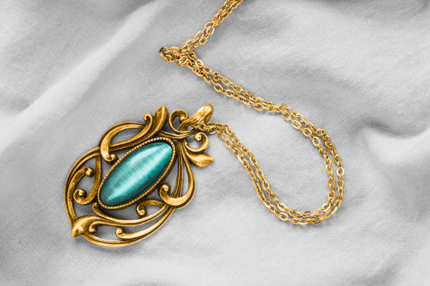 istock Necklace on white textile 1249992634