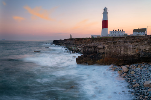Evening descends upon Portland Bill Lighthouse on hate Dorset coast, UK.