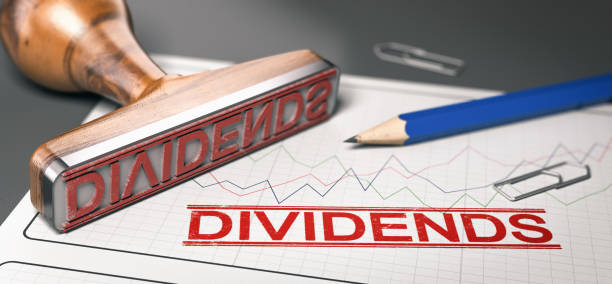 Dividends, distribution of profits by a corporation to shareholders. stock photo