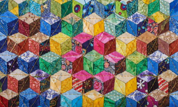 istock Fragment of quilt sewn from diamonds and has view three-dimensional 1249995029