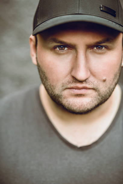 istock Male Portrait With Baseball Hat 1249997170