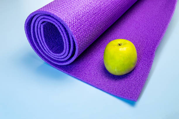 istock Fitness mat jump rope apple water 1249998210