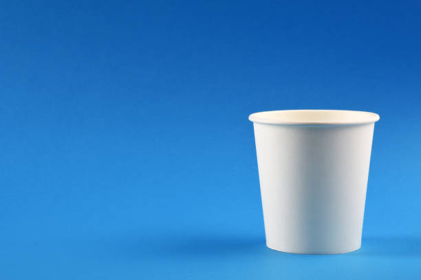 istock A paper coffee cup on blue background 1250000584