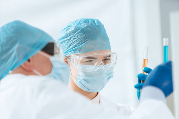 istock close up. scientists compare liquids in test tubes 1250001666