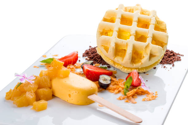 istock Dessert with waffle and creme brulee on a white background 1250002128