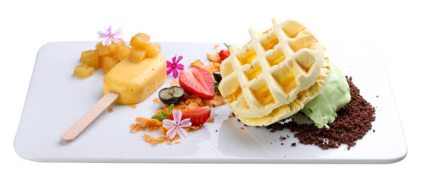 istock Dessert with waffle and creme brulee on a white background 1250002222