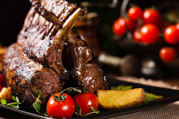 istock Baked lamb loin, served with asparagus. 1250005254