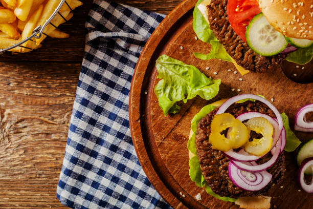 istock Homemade, beef hamburger with cheese and vegetables. 1250008096