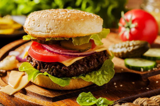 istock Homemade, beef hamburger with cheese and vegetables. 1250009922