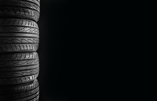 Car tires isolated on black background,copy space