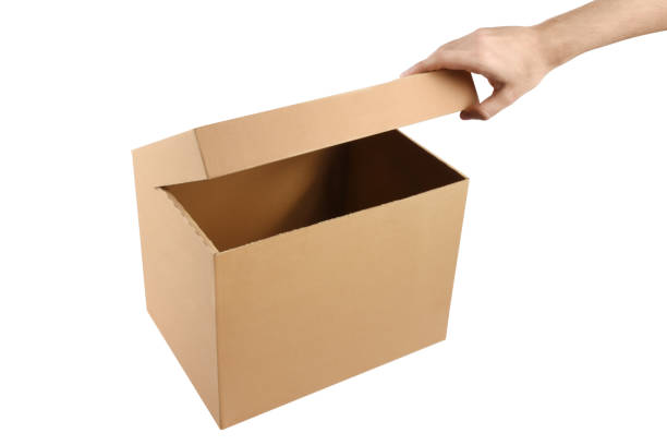 istock Man hand opening cardboard box (Clipping path) on white background 1250011542