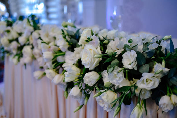 istock Flower arrangement on the table of the newlyweds 1250017607