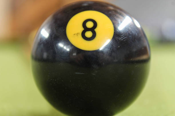 istock Playing a game of billiards 1250018775