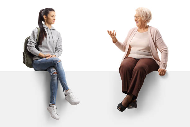 istock Female student sitting on a panel and talking with an elderly woman 1250019248