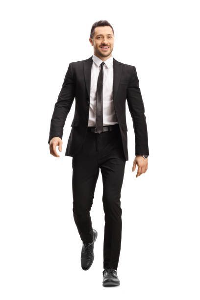 Businessman walking towards camera
