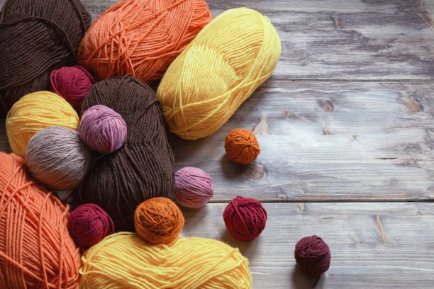 istock Colorful balls of wool. Free space for text 1250020540