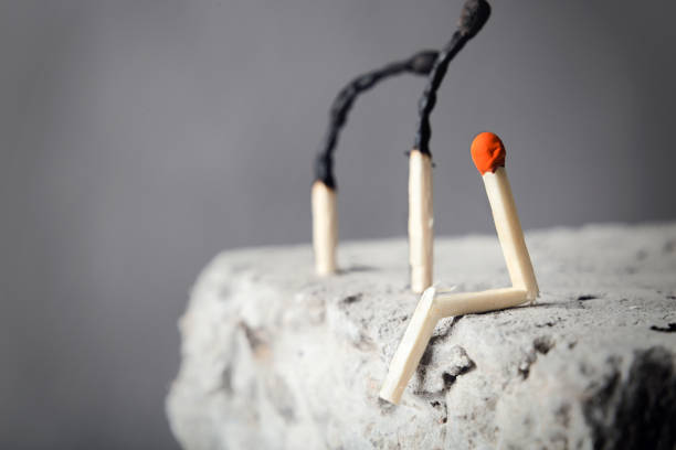 Three matches, one whole orange color. Concepts individuality.