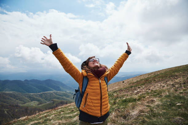 istock Woman enjoying on a mountain fresh air. 1250022669