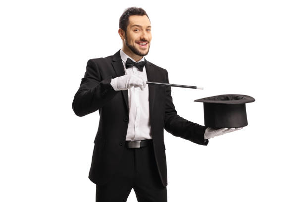 istock Magician performing a hat-trick with a magic wand 1250022808
