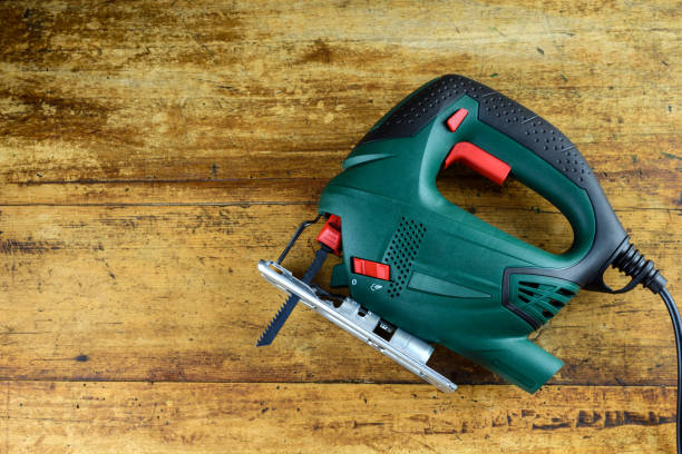 istock Electric jig saw on wooden table 1250025633