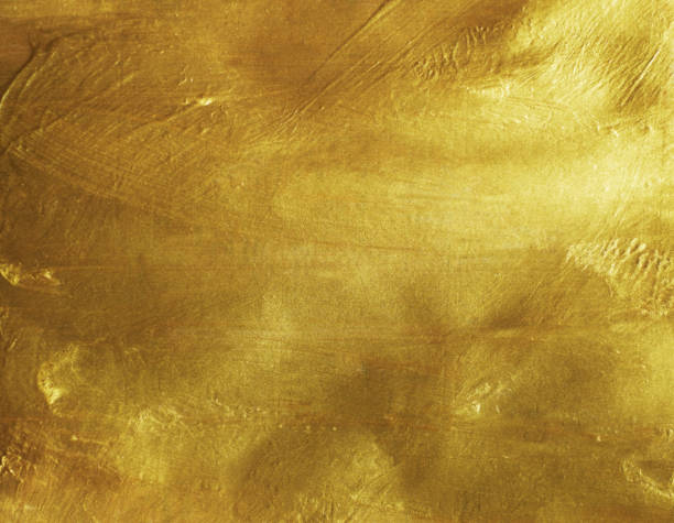 istock Gold color on paper texture background 1250026885