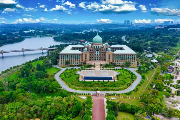 Photo of Aerial View Of Jabatan Perdana Menteri at daytime on blue sky background in Putrajaya, Malaysia