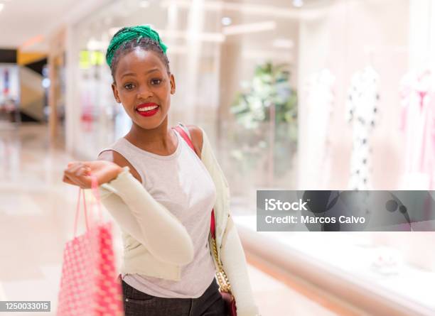 Young Happy And Beautiful Afro American Girl At Buying Shopping Mall ...