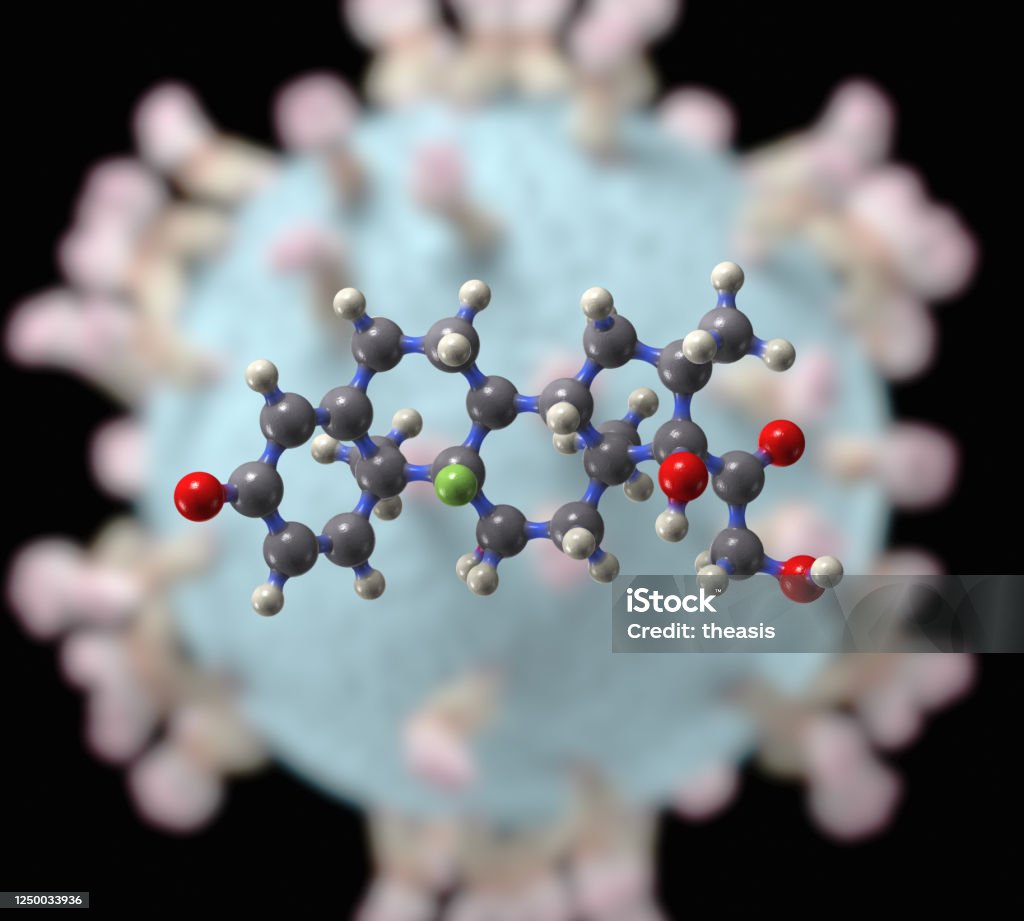 Dexamethasone A molecular model of the drug dexamethasone. One of the first drugs proven to cut the risk of death from COVID-19. It is a cheap steroid drug used in many treatments.
Virus capsid in the background. Dexamethasone Stock Photo