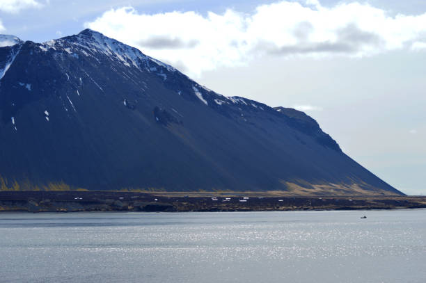 istock Coast mountain slope next to fjord 1250038133