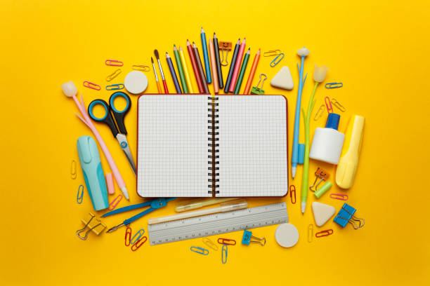istock Back to school, items on yellow background. Welcome to learning. Sale accessories for knowledge, retail. Study shopping. Copy space for text 1250039510