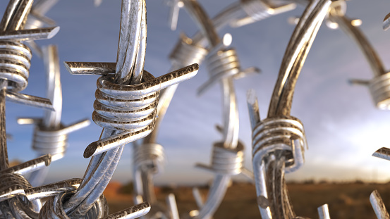 New barbed wire against the sky. 3d render