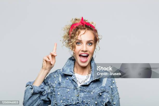 Portrait Of Excited Young Woman In 80s Style Outfit Stock Photo - Download Image Now