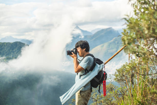 istock Japanese taking photo on mountain peak 1250046007